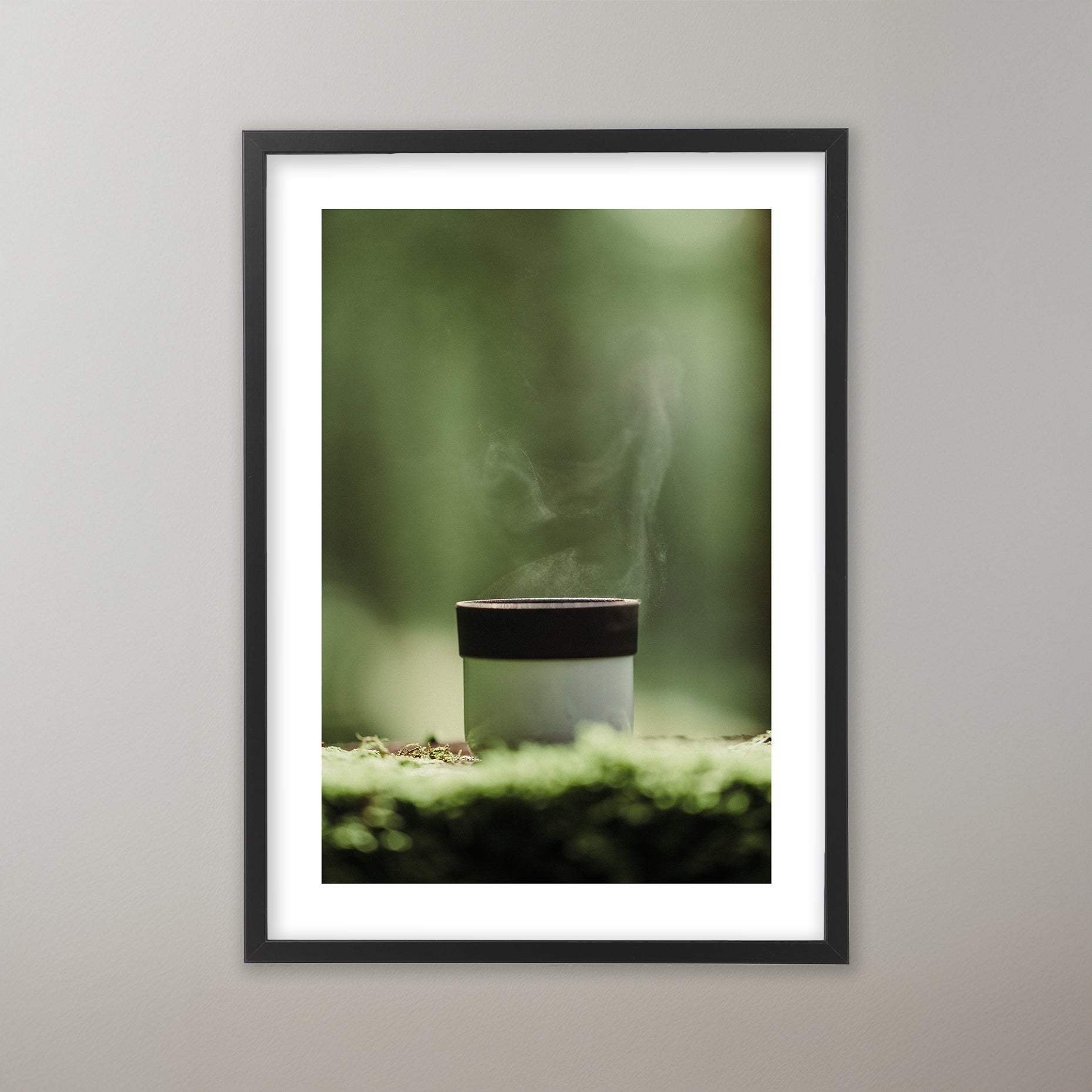 En rykande kopp kaffe i en grönskande skog, Bohuslän. Poster i olika storlekar: 30x40 cm, 40x50 cm, 50x70-cm, 70x100 cm.